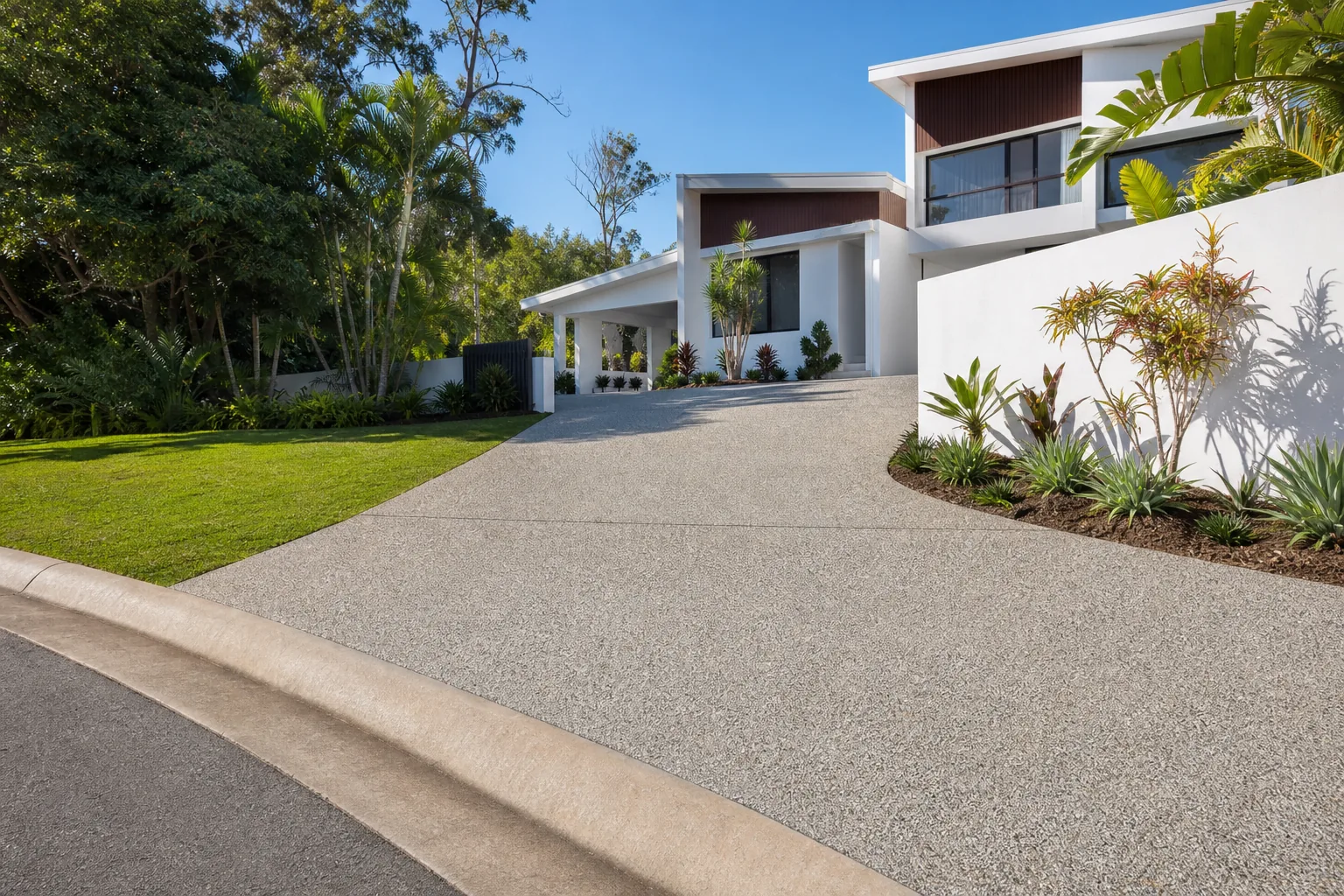 Exposed aggregate concrete driveway at a subtropical Gold Coast home